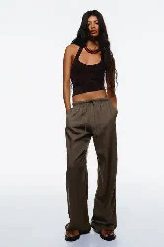Linen-blend pants with an elastic waistband. - 1