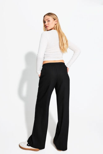 Linen-blend pants with an elastic waistband. - 4