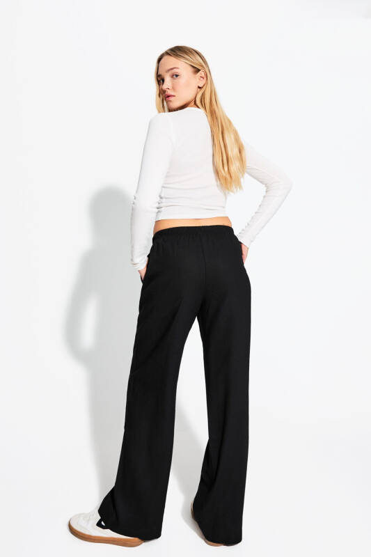 Linen-blend pants with an elastic waistband. - 4