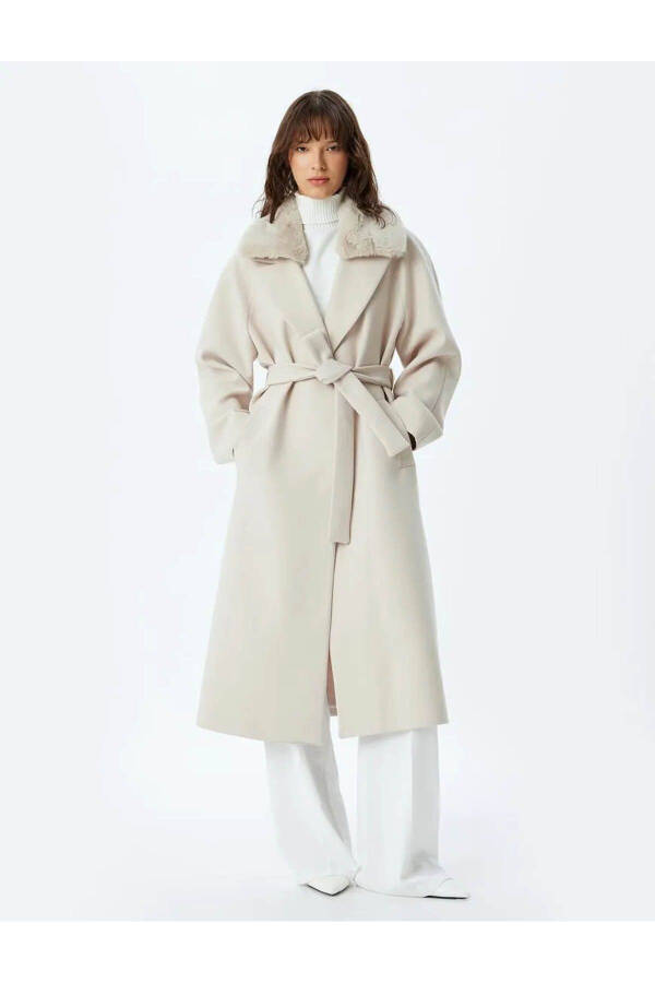 Long cashmere coat with faux fur collar, pockets and belt. - 17