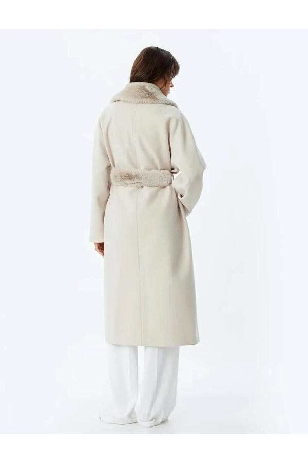 Long cashmere coat with faux fur collar, pockets and belt. - 19