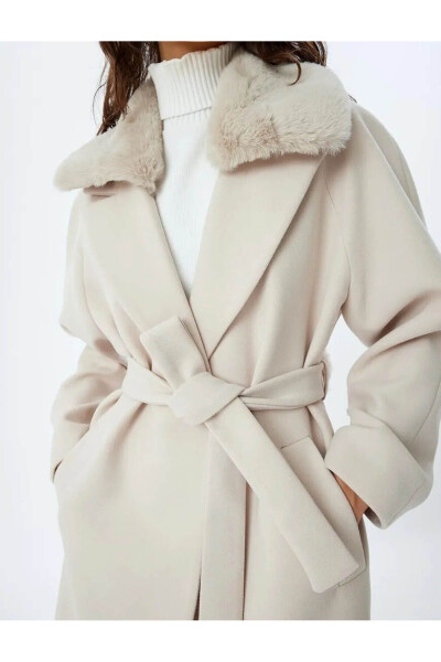 Long cashmere coat with faux fur collar, pockets and belt. - 20