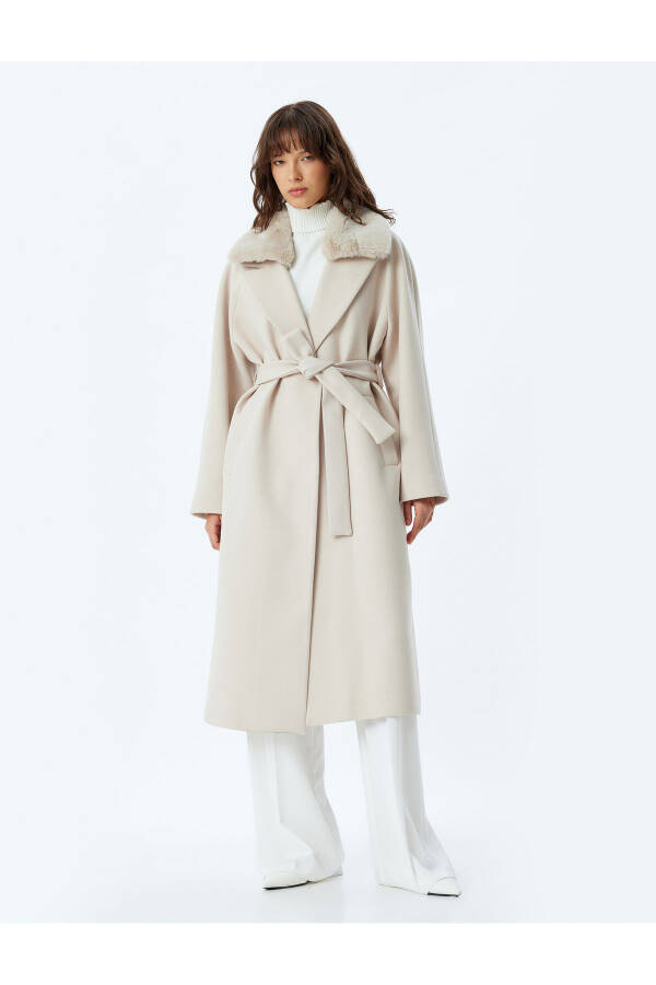 Long cashmere coat with faux fur collar, pockets and belt. - 13