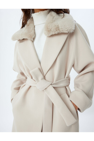 Long cashmere coat with faux fur collar, pockets and belt. - 9