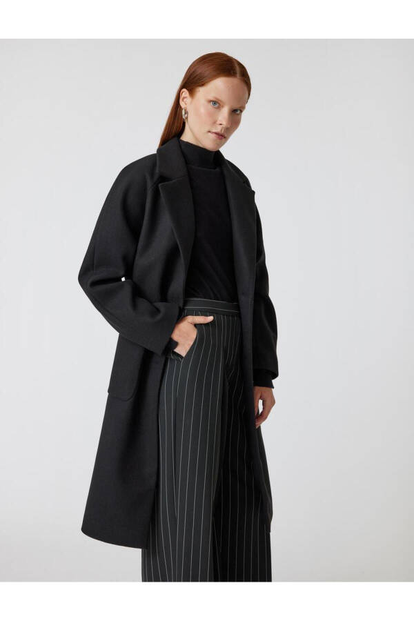 Long, double-breasted, lapel pocket cashmere coat. - 2