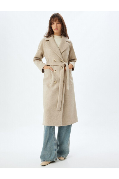 Long, double-breasted, pocket and belt detailed cashmere coat. - 25