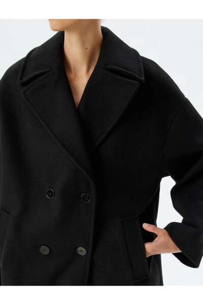 Long, oversized cashmere coat, double-breasted, shawl collar, buttoned pockets. - 34