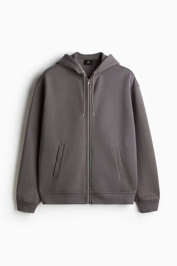 Loose fit hooded sweatshirt with zipper. - 1