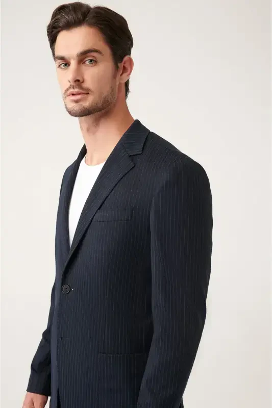 Men's black, unlined, stretch knit jacket with double vents. - 2