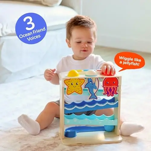 Move2Play, Wooden Ocean Friends | 30+ Fin-Tastic Songs & Phrases | Baby & Toddler Musical Toy | First Birthday Present for 1+ Year Old | Ages 6-24 Months | Boy & Girl Ball Drop Toy - 3