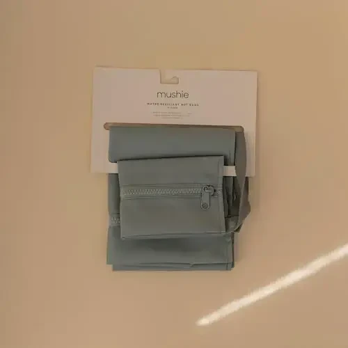 mushie Water Resistant Wet Bags | Large & Small Reusable Storage Bag for Baby Items and Travel | Zippered Pockets with Handle | Machine Washable, Set of 2 (Roman Green) - MUSHIE (1)