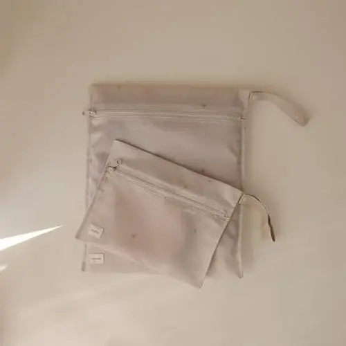 mushie Water Resistant Wet Bags | Large & Small Reusable Storage Bag for Baby Items and Travel | Zippered Pockets with Handle | Machine Washable, Set of 2 (Sun) - 3