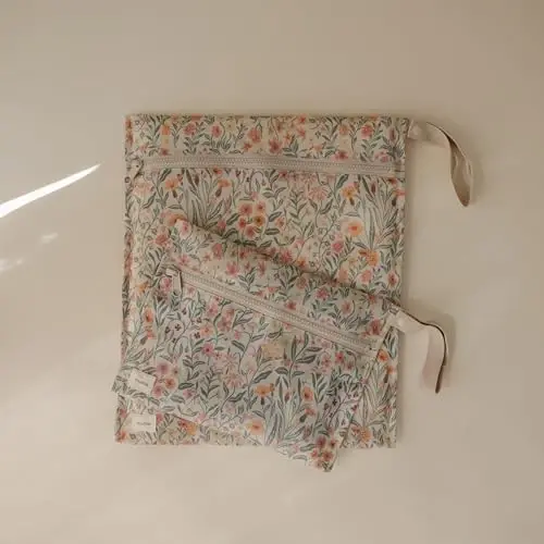 mushie Water Resistant Wet Bags | Large & Small Reusable Storage Bag for Baby Items and Travel | Zippered Pockets with Handle | Machine Washable, Set of 2 (Pastel Blooms) - 3