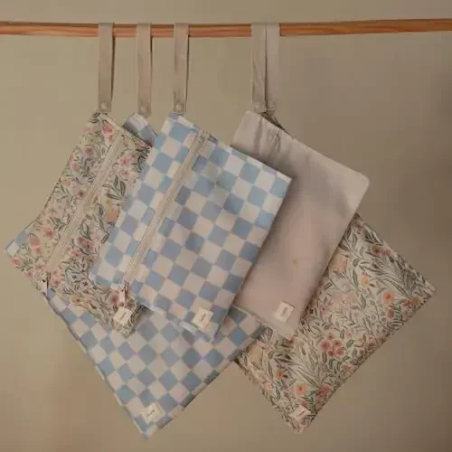 mushie Water Resistant Wet Bags | Large & Small Reusable Storage Bag for Baby Items and Travel | Zippered Pockets with Handle | Machine Washable, Set of 2 (Pastel Blooms) - 4