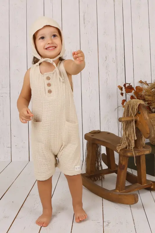 Müslin Bebek Önden Düğmeli Tulum-Krem - BEW TEX