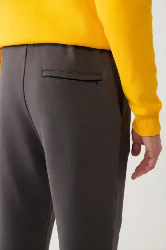 Мужские антрацитовые спортивные штаны с шнурком на талии, резинкой на штанинах, трехниточные с начесом E003402-Антрацит - 7