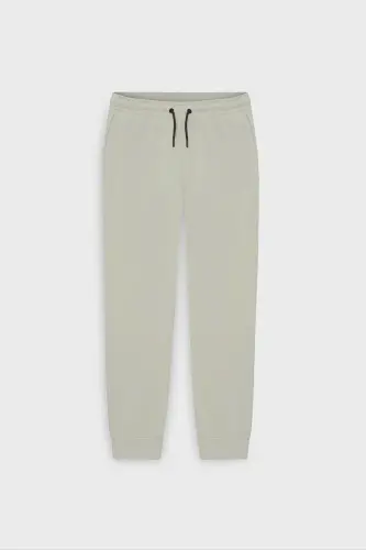 Мужские бежевые стандартные удобные спортивные штаны с эластичной талией и манжетами стандартного кроя - 7