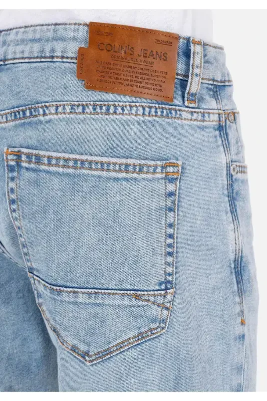 Мужские джинсы с низкой талией, прямого кроя, синего цвета. - 6