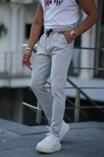 Мужские джоггеры с боковыми карманами, эластичной талией на шнурке, двойными манжетами, свободного кроя - СВЕТЛО-СЕРЫЙ - 1