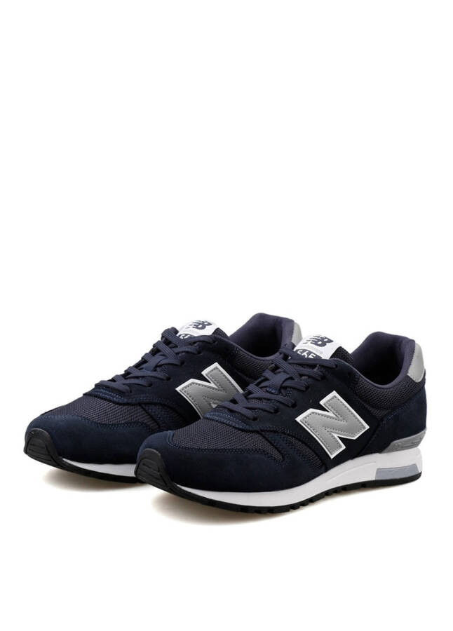 Мужские кожаные повседневные кроссовки New Balance синего цвета ML565NVY - 8