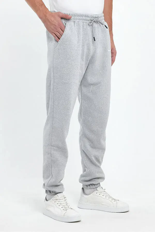 Мужские серые спортивные штаны в стиле regular fit с эластичным поясом, принтом 