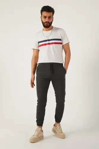 Мужские спортивные штаны с эластичным поясом и узким кроем - 8