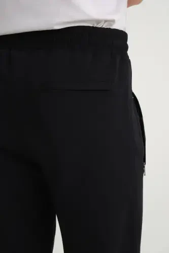 Мужские темно-синие спортивные штаны из трикотажной ткани прямого кроя с вышивкой - темно-синие - 4