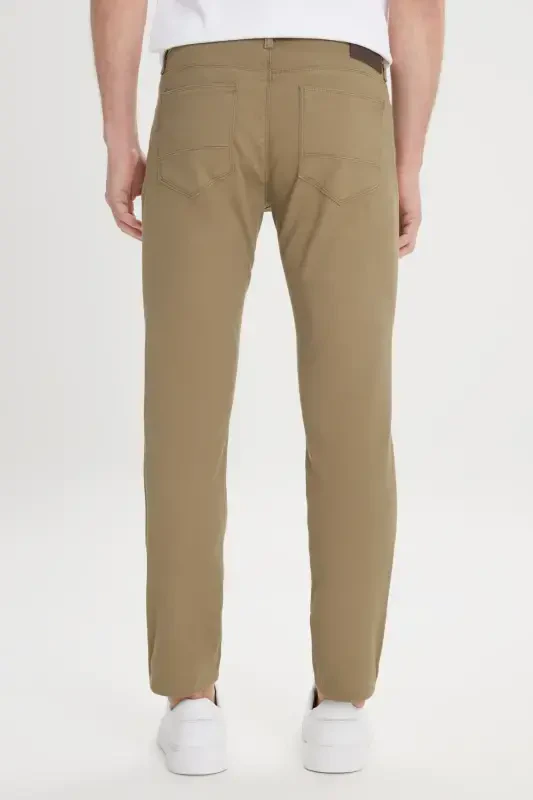 Мужские зеленые узкие эластичные брюки Slim Fit с пятью карманами и текстурным плетением - 7