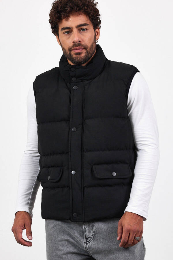 New season men's padded black puffer vest with zipper and snap closure. - 1