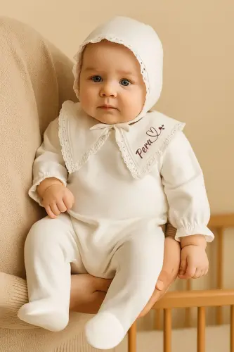 Newborn baby girl hospital discharge set with romper, hat and mittens. 