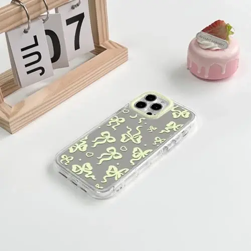 NITITOP iPhone 13 Pro uchun mos keladigan g'ilof, ayollar va qizlar uchun yoqimli oyna, kamon, yurak naqshli, lental dizayni, zarbaga chidamli kumush himoya telefon qopqog'i - Sariq kamon - 4