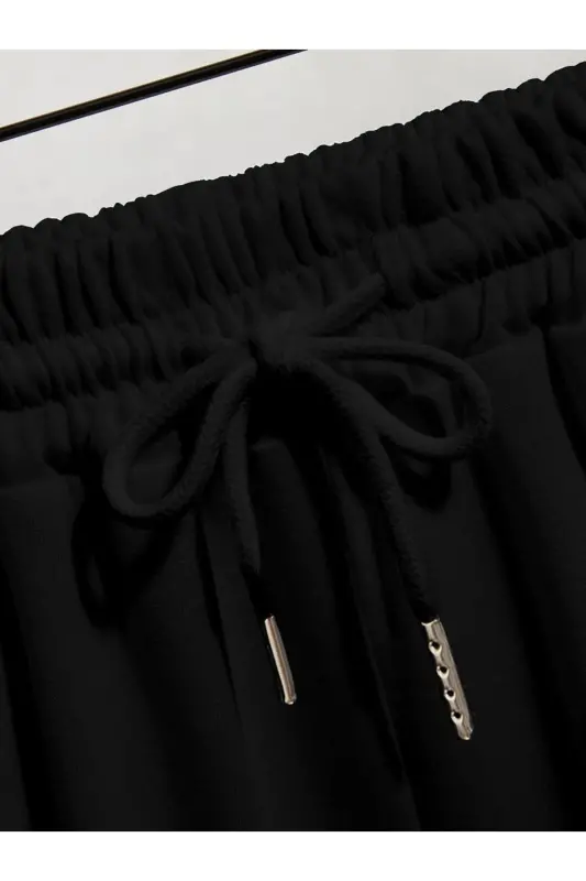 Оверсайз костюм с принтом на спине, шортами и топом. - 5