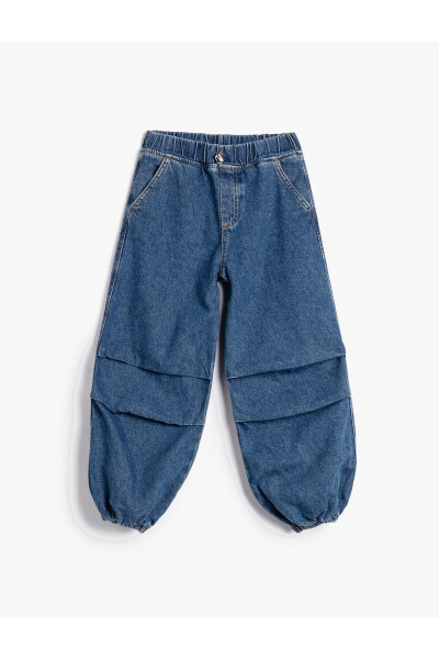 Parachute jeans with folded details and pockets. - 8