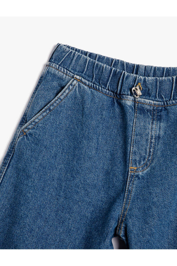 Parachute jeans with folded details and pockets. - 10