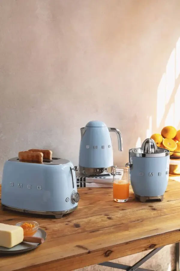 Pastel blue kettle, toaster and citrus juicer set. - 1
