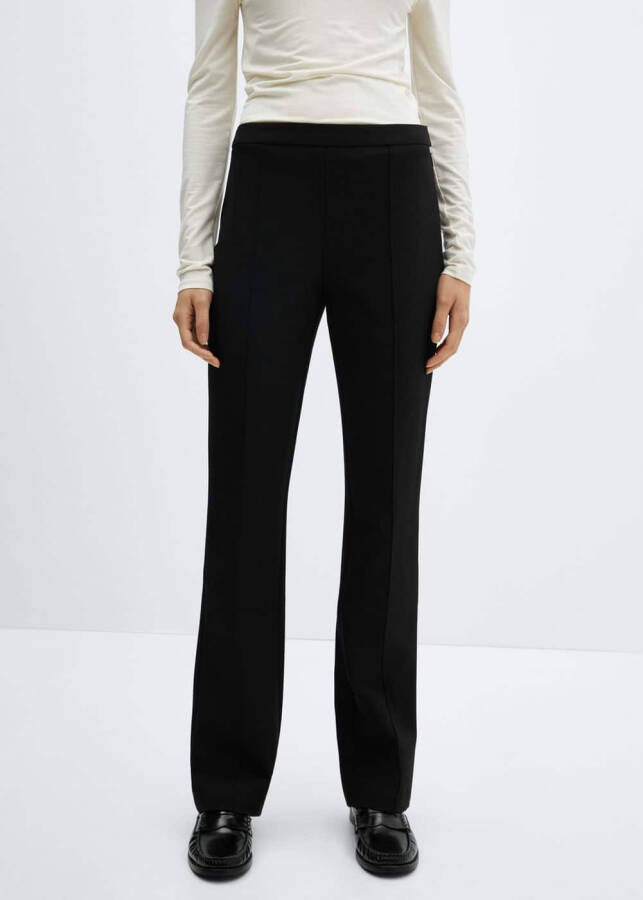 Plain tailored trousers with stitch details - 12