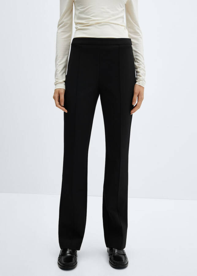 Plain tailored trousers with stitch details - 7