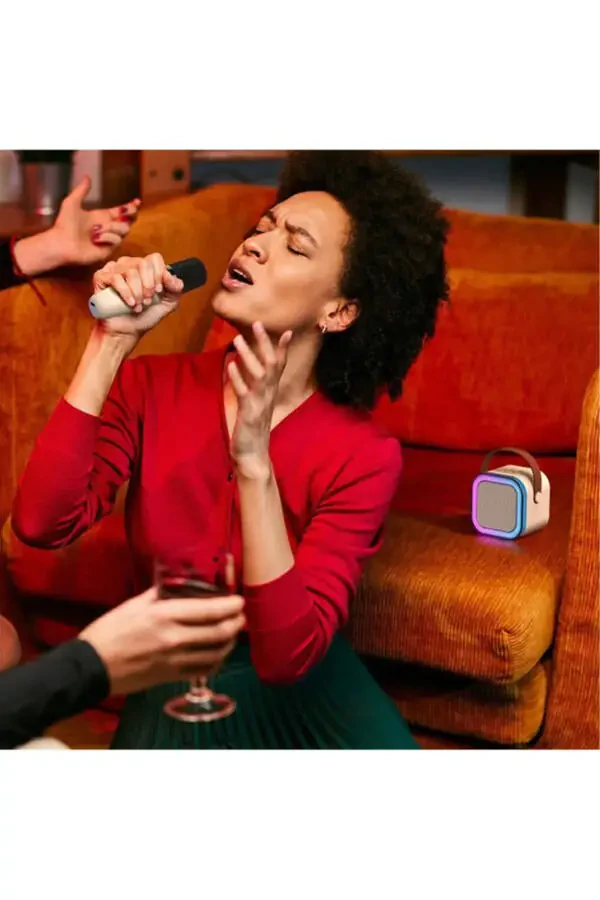 Портативный караоке-микрофон для детей со световыми эффектами и колонкой. - 7