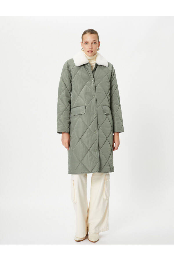 Puffy quilted jacket with plush collar and pocket details. - 3