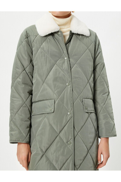 Puffy quilted jacket with plush collar and pocket details. - 5