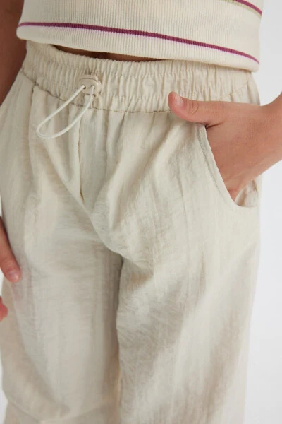 Qizlar uchun parashyut matodan tayyorlangan jogger shimlari D0646A824SM - 5