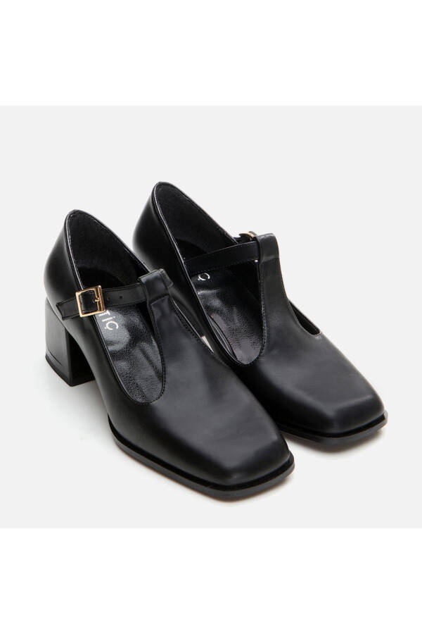 Qora ayol qalin poshnali - 2