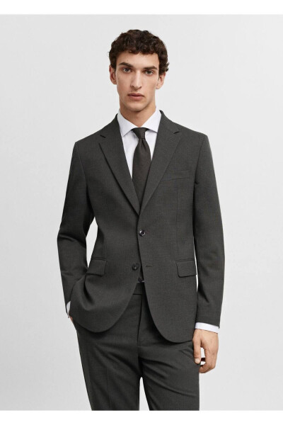 Qulay cho'ziladigan mato yordamida ishlangan tor blazer pidjagi - MANGO MAN