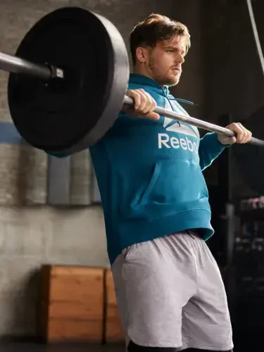 Reebok Erkaklar va kattalar uchun Delta logoli flis kapşonlu futbolka, o‘lchamlari S-3XL - 1