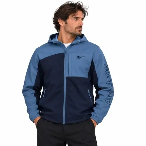 Reebok Mens Lightweight Fleece-Lined Softshell Jacket, Wind Resistant Hood | Wind and Water Resistant Shell for Daily Commutes or Travel, Streamlined Athletic Cut, Protective Collar for Chilly Mornings - 1