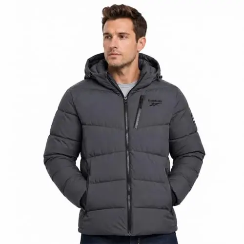 Reebok Mens Puffer Jacket Water & Wind Resistant Hooded Stretch Winter Coat | Soft Insulation with High-Stretch Shell That Moves With You, Rib-Knit Storm Cuffs and Three Zip Pockets for Daily Essentials - 1