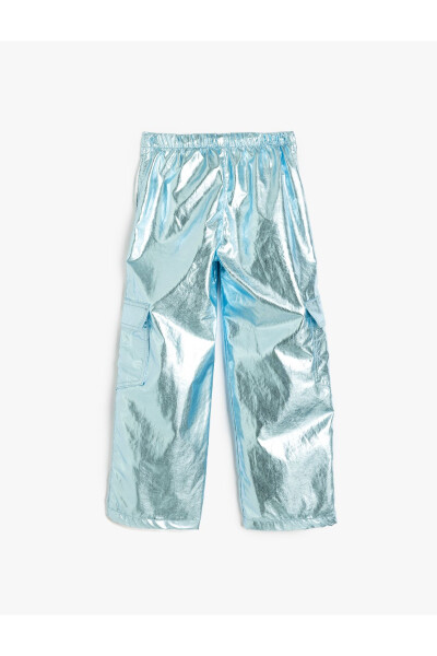 Shiny, iridescent parachute pants with pocket and button details. - 5