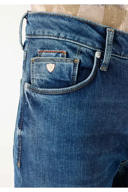 Синие брюки для мужчин с прямыми штанинами, низкой талией и стандартным покроем. - 5