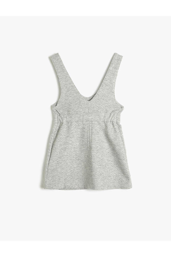 Sleeveless mini jumpsuit with metal button details. - 5