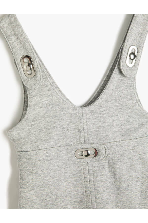 Sleeveless mini jumpsuit with metal button details. - 6